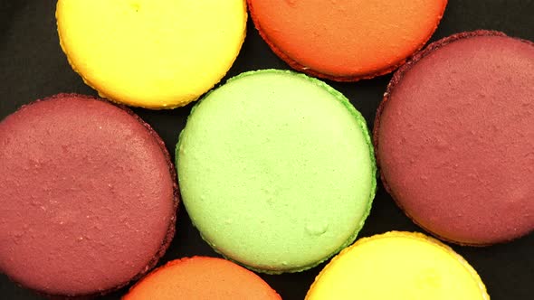 Colorful Macaroons on a black table