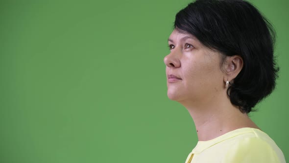 Profile View of Beautiful Businesswoman with Short Hair alt