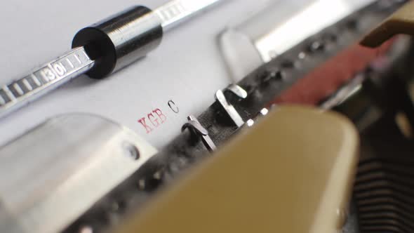Typing "KGB CASE" on an Old Typewriter alt