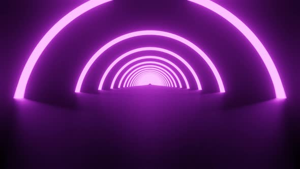 Tunnel of circle shaped pink neon lights.