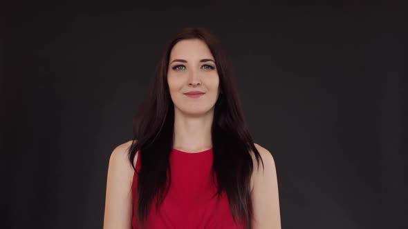 Beautiful Girl with Long Hair Standing Straight and Smiling alt