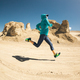 Fitness woman trail runner cross country running on sand desert - PhotoDune Item for Sale