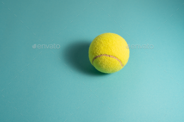 Tennis ball with light blue background Stock Photo by Pasanheco | PhotoDune