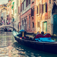 Gondola on canal in Venice, Italy. - PhotoDune Item for Sale