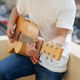 acoustic guitar in musician&#39;s hands - PhotoDune Item for Sale