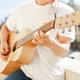 acoustic guitar in guy&#39;s hands - PhotoDune Item for Sale