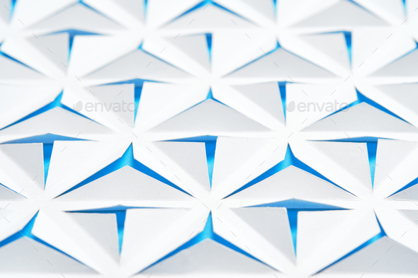 Abstract geometric background photo. Triangles cut out in paper. White and blue color. - Stock Photo - Images