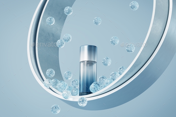 Unbranded glass cosmetic bottle on a blue background inside metal rings. Falling crystal balls.  - Stock Photo - Images