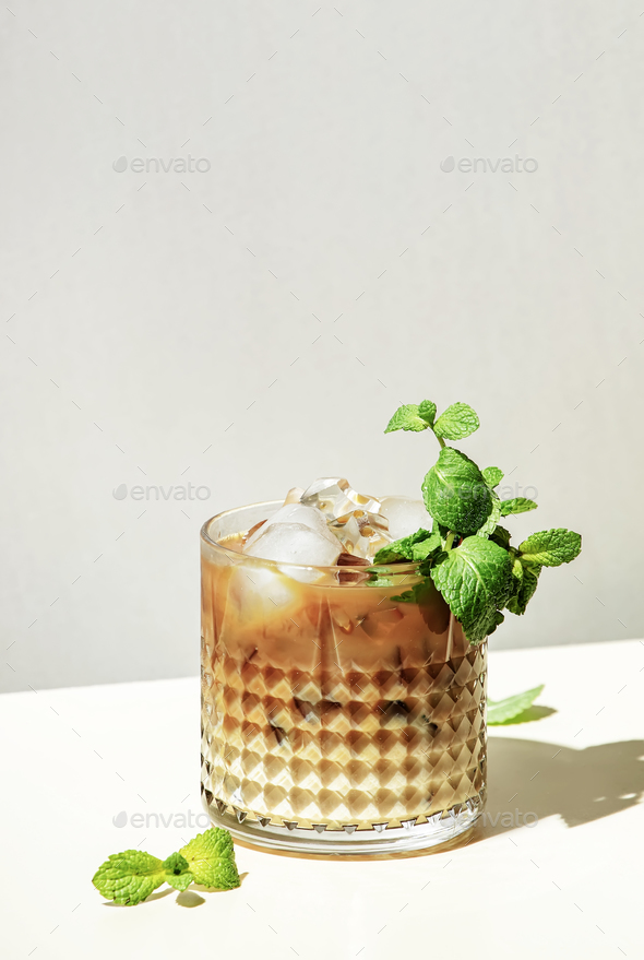 Mint White Russian alcoholic cocktail drink with vodka, coffee liqueur, mint schnapps, cream and
