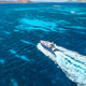 Aerial view of fast floating yacht on blue sea at sunny day - PhotoDune Item for Sale