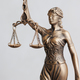 close-up themis is goddess of justice statuette on dark background. symbol of law with scales  - PhotoDune Item for Sale