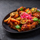 Grilled Lemon and garlic chicken wings with pickled root vegetables and jalapenos.  - PhotoDune Item for Sale