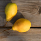 Yellow pears on a wooden background close-up - PhotoDune Item for Sale