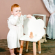 Little redhead baby girl celebrates first birthday anniversary. 1 year family party Professional  - PhotoDune Item for Sale