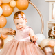 Little redhead baby girl celebrates first birthday anniversary. 1 year family baloons party.  - PhotoDune Item for Sale