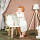 Little redhead baby girl celebrates first birthday anniversary. 1 year family party Professional  - PhotoDune Item for Sale