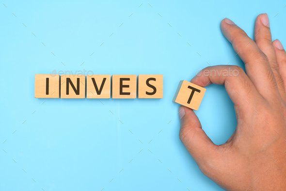 Investment text on blue background, Investment strategy and benefits ...