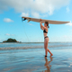 Surfing, Girl surfer with a longboard on the beach of Weligama, Indian Ocean Active water sports, tr - PhotoDune Item for Sale