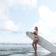Surfing, Girl surfer with a longboard on the beach of Weligama, Indian Ocean Active water sports, tr - PhotoDune Item for Sale