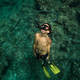 Shirtless boy swimming underwater in ocean - PhotoDune Item for Sale