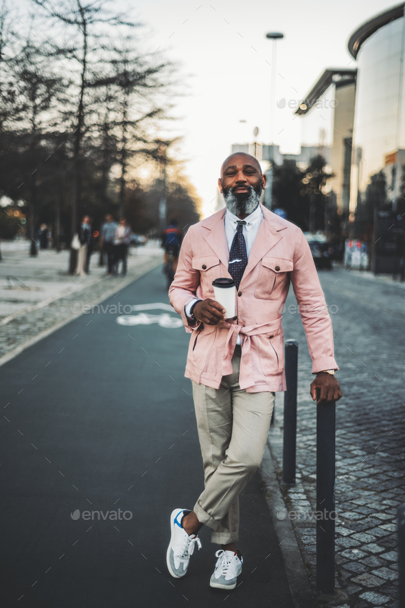Charming Black Man in Pink Jacket - Stock Photo - Images