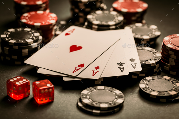 Poker cards and chips on black background, gambling casino table - Stock Photo - Images