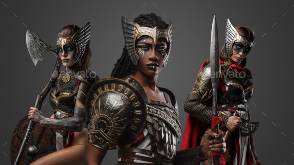 Three female warriors from past with armors and cold steel - Stock Photo - Images