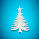 Christmas tree on a background of blue paper - PhotoDune Item for Sale