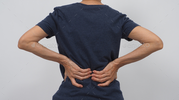 Asian senior or older woman had a back pain posture on white background.