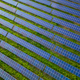 big solar power station on a green meadow aerial view - PhotoDune Item for Sale
