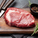 Raw ribeye steak on cutting board - PhotoDune Item for Sale