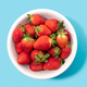 Fresh strawberries in bowl isolated on blue background - PhotoDune Item for Sale
