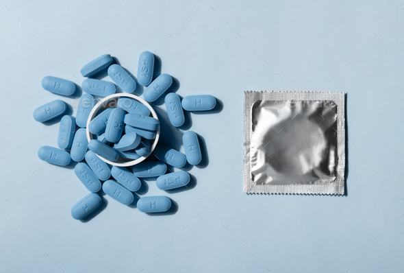 Open bottle of prescription PrEP Pills for Pre-Exposure Prophylaxis to help protect people from HIV. - Stock Photo - Images