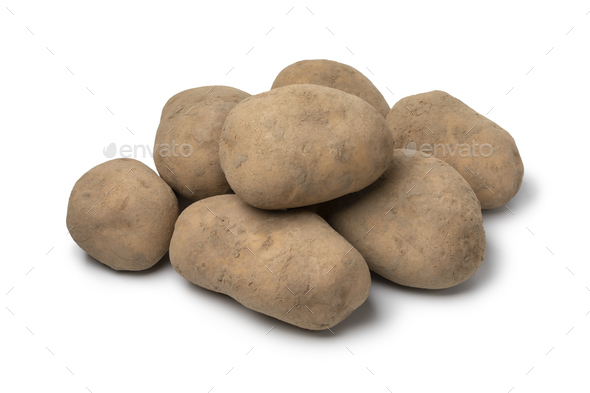 Heap of fresh Dutch variety potato called Bintje on white background ...