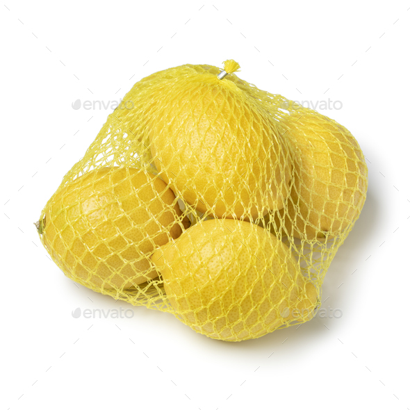 Yellow net with whole fresh lemons close up on white background - Stock Photo - Images