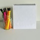 Notepad and colored pencils in jar - PhotoDune Item for Sale