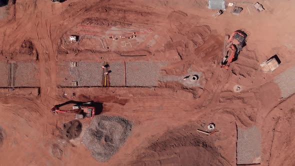 Working Excavator Machine, Housing Construction Site Infrastructure Works Bird's Eye View Aerial