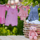 washing baby clothes. Linen dries in the fresh air. Selective focus. - PhotoDune Item for Sale