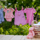 washing baby clothes. Linen dries in the fresh air. Selective focus. - PhotoDune Item for Sale