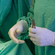 During surgical procedure surgeon hand was enclosed in pair of medical protective gloves - PhotoDune Item for Sale