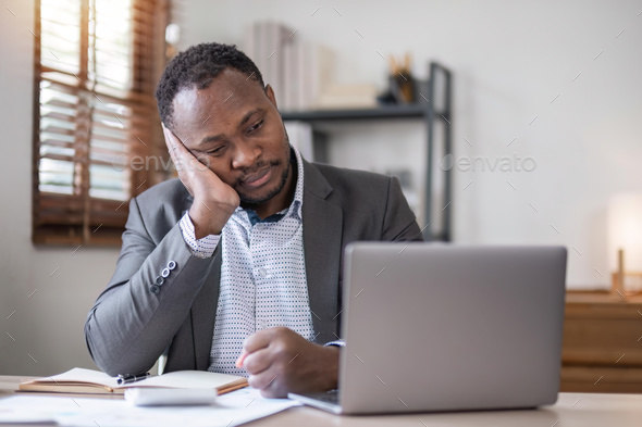 Headache, stress and businessman on laptop in his office with accounting management, finance - Stock Photo - Images