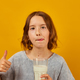 Pretty teen girl, child with a fresh glass of milk - PhotoDune Item for Sale