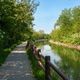 Cycleway along VIlloresi canal, Milan, Italy - PhotoDune Item for Sale