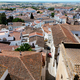 Cityscape of Evora with typical houses painted in white and ceramic tiled roofs - PhotoDune Item for Sale