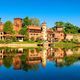 Scenic view of a Medieval village reflecting in a river in Valentino park on a sunny day - PhotoDune Item for Sale