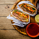 Hamburger or sandwich, beef torta with salsa dip and guacamole. Mexican cuisine. - PhotoDune Item for Sale