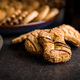 Assorted various cookies. Sweet biscuits  on black table. - PhotoDune Item for Sale