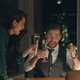 Couple coworkers drinking champagne celebrating business success at office. - PhotoDune Item for Sale