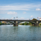Triana Bridge at Guadalquivir River and Sevilla Tower (Torre Sevilla) - Seville, Andalusia, Spain - PhotoDune Item for Sale