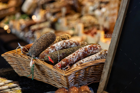 Sausages and meat products variety in a store display, closeup view - Stock Photo - Images